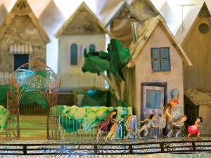 Ontario author/illustrator Elly MacKay built the images for her new book, Butterfly Park, by painting and cutting paper, building tiny dioramas and creating mood with the use of special lighting, then photographing the results. (Image courtesy of Running Press Kids, publisher of the new picture book)